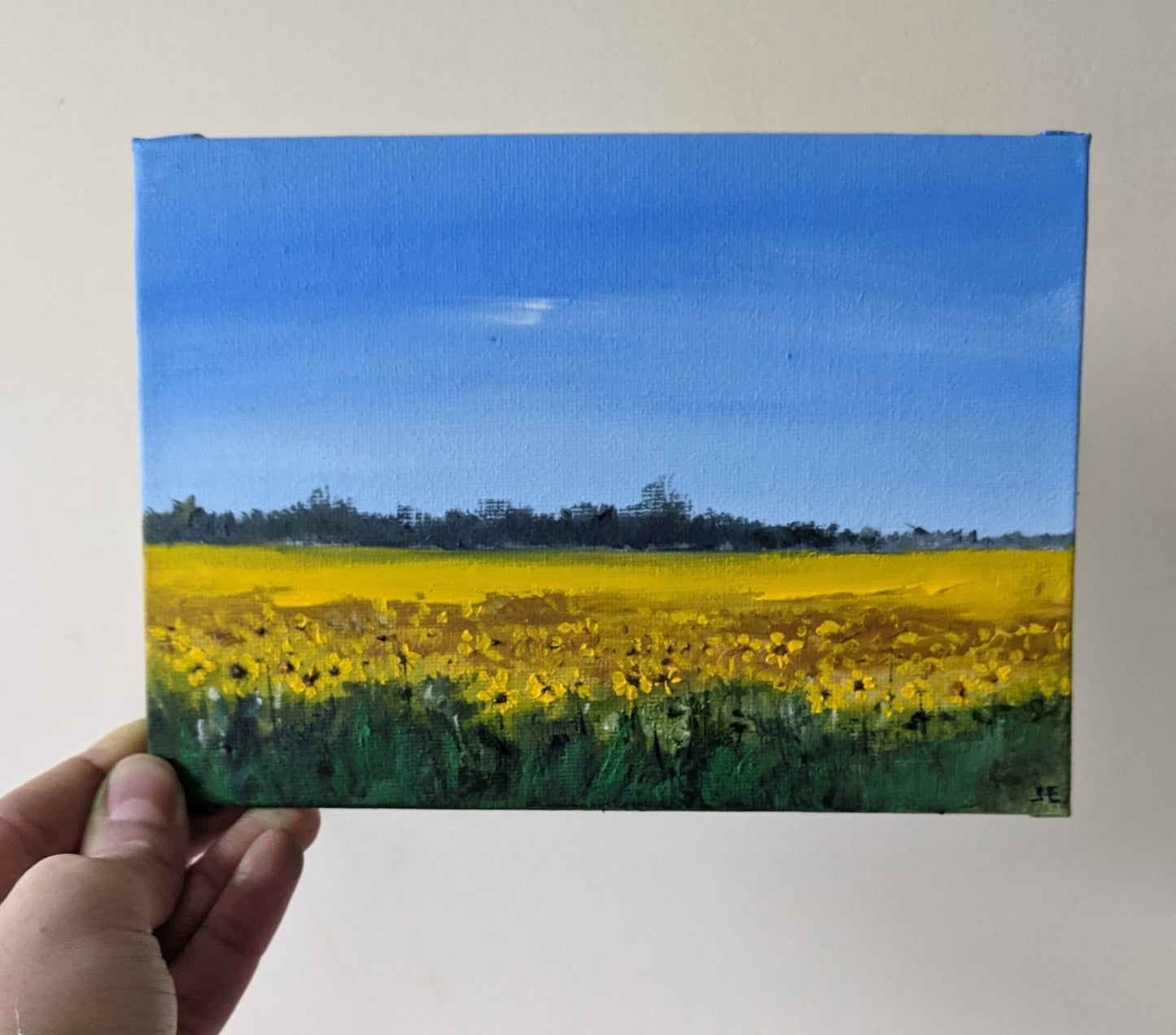 Miniature Sunflowers Landscape oil painting on canvas board in studio, by Jo Earl