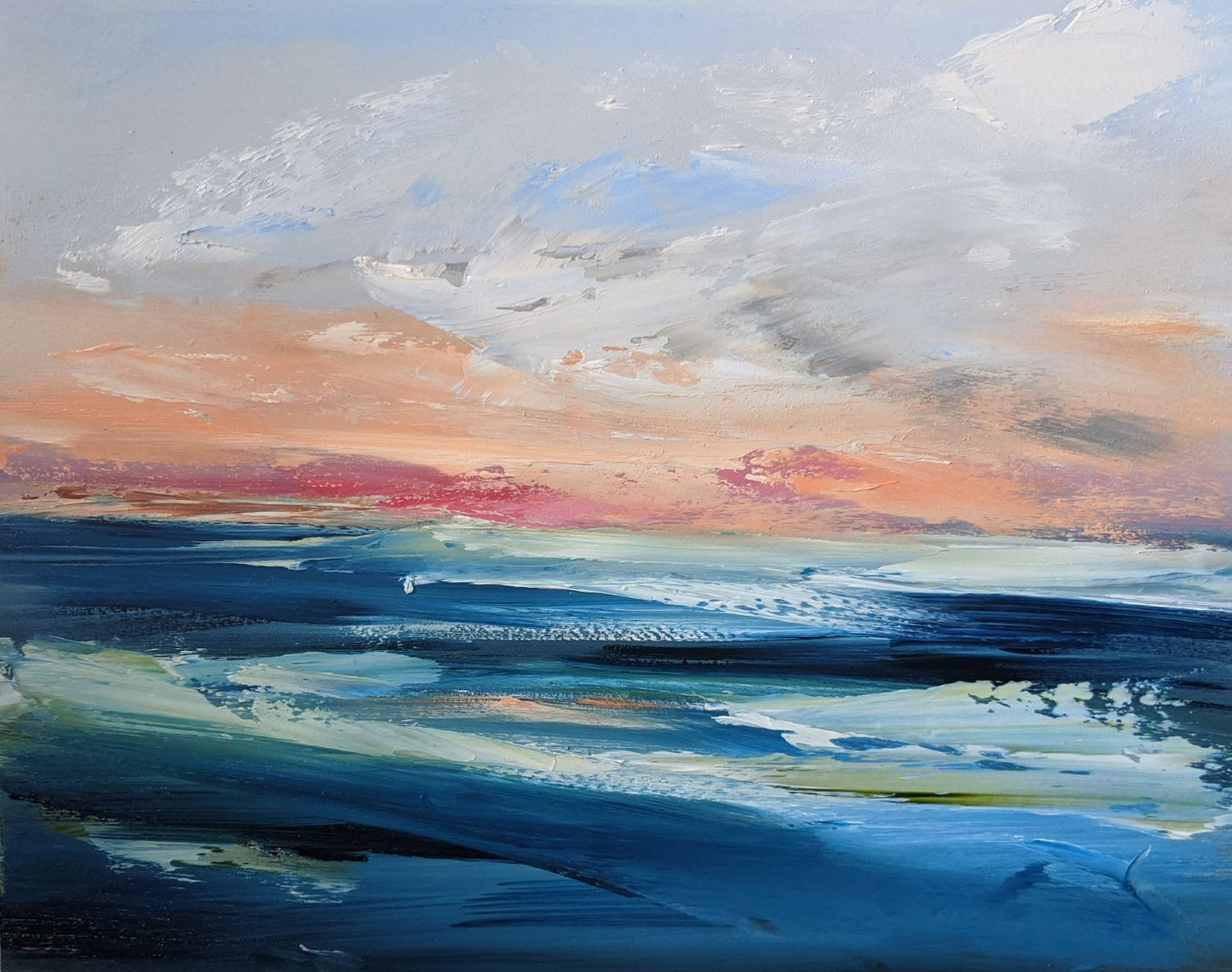 Sunset over unsettled seas oil painting by Jo Earl | Blue turbulent sea with an orange sunset in the horizon on cloudy skies