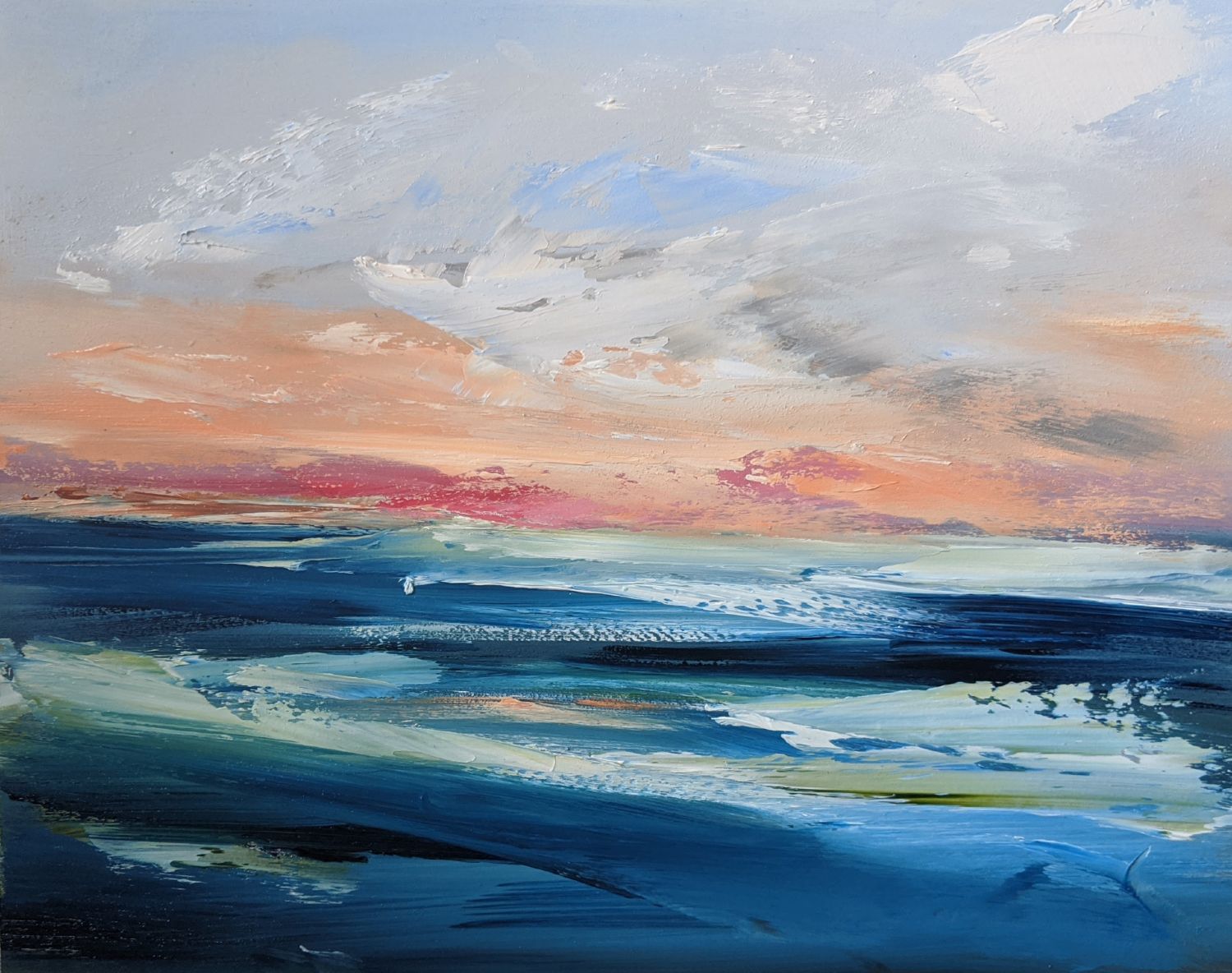 Sunset over unsettled seas oil painting by Jo Earl | Blue turbulent sea with an orange sunset in the horizon on cloudy skies